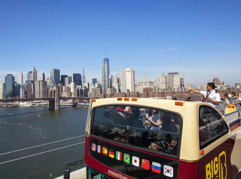 big-bus-tour-in-new-york-passing-over-a-bridge_1.webp