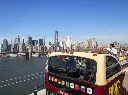 big-bus-tour-in-new-york-passing-over-a-bridge_1.webp